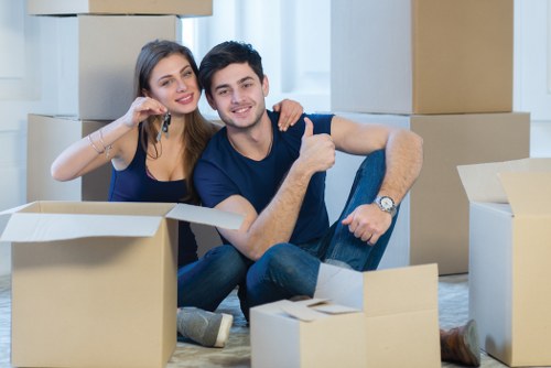 Team member handling furniture safely during a removals job