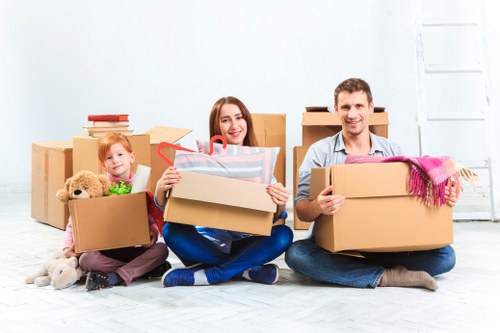 Local moving team preparing boxes and furniture for transport