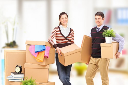 Loading furniture into a removal truck for storage transfer