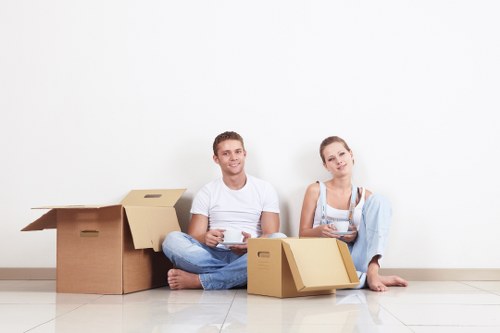 Professional movers handling storage-related items in Andstorage
