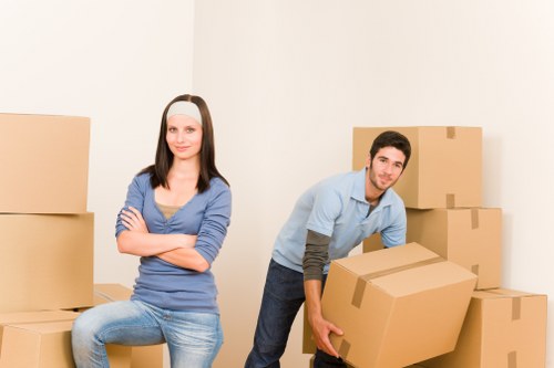 Professional movers loading boxes and home items for an Andstorage move