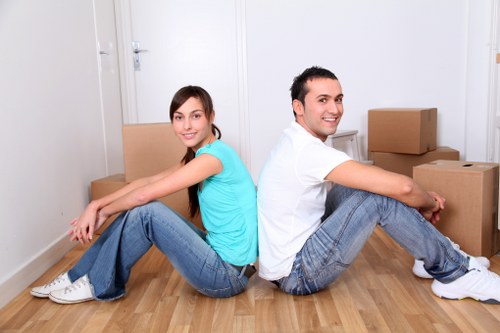 House removal preparation in Andstorage with labelled boxes and furniture