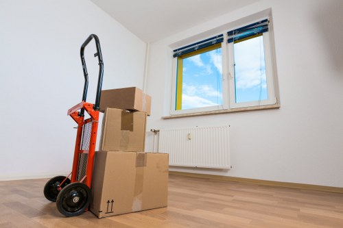 Careful loading of sofas and tables during Andstorage furniture collection