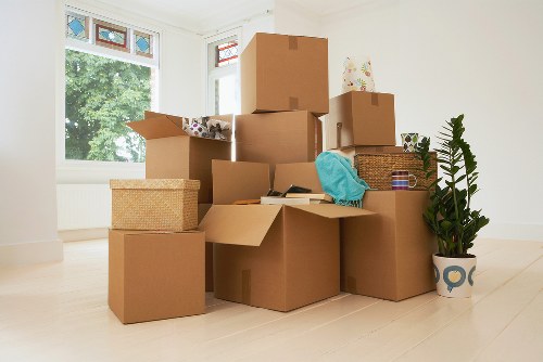 Office furniture being moved through a building with access considerations