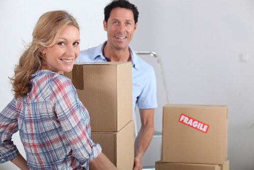 Boxes and furniture being loaded for transport in Andstorage