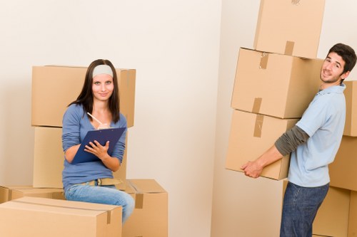 Boxes and furniture being separated for charity reuse and recycling